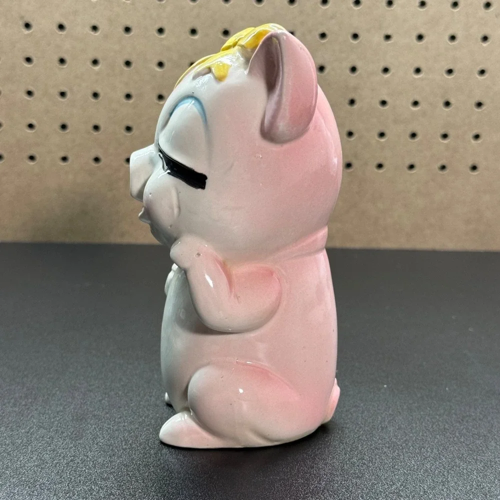 Vintage Japanese Ceramic Piggy Bank with Winking Expression And a Yellow Bow - Picture 3 of 11
